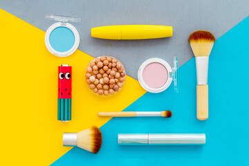 Multicolor pattern of makeup products and colorfull cosmetics. Flat lay top view