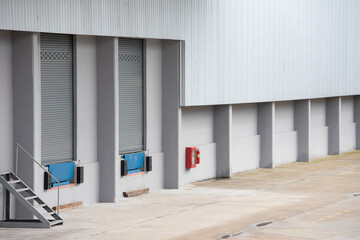 close shutter steel doors of warehouse. factory plant shutt down. concept : shutdown recession economy, stop production.