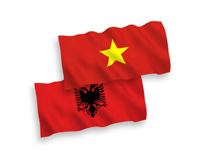 Flags of Albania and Vietnam on a white background