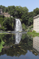 Obraz premium Isola del Liri, Italy - July 22, 2017: View of the waterfall in the river town of Isola del Liri