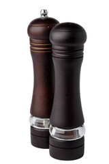 Wooden mills with salt and pepper on white