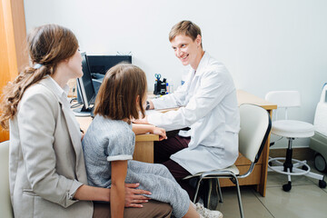 Obraz premium Mother and daughter came to pediatrician for health examination.