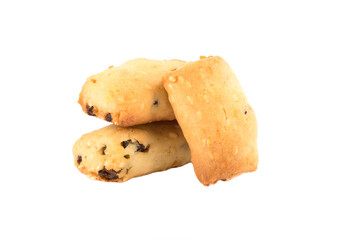 Three freshly baked homemade cookies with raisins isolated on a white background.
