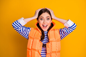Shocked crazy positive girl have life vest impressed important rescue beach work touch hands head...