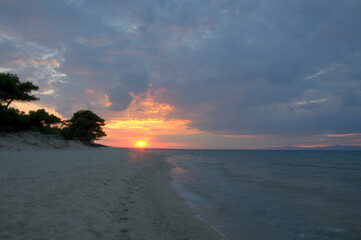 Sunset over the sea and beautiful cloudscape.