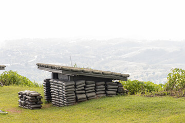 Sandbag bunker of the old military bunker base on the mountain. Old bunker war make of sandbag for the military on the mountain. 