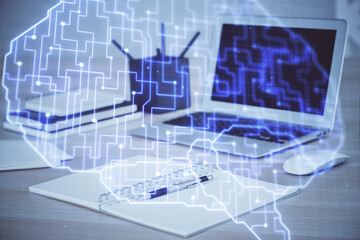 Multi exposure of work table with computer and brain hologram. Brainstorm concept.