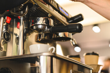 coffee machine. coffee machine preparing fresh coffee and pouring into  cups.