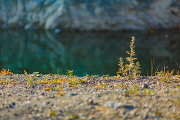 Mountain lake, Crystal clear water, rocky mountains and clear sky.