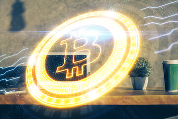 Multi exposure of blockchain theme hologram and table with computer background. Concept of bitcoin crypto currency.