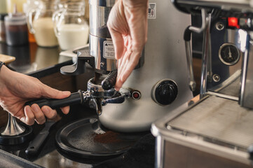 using of coffee machine at the cafe. close up image