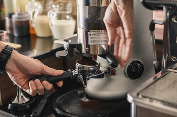 using of coffee machine at the cafe. close up image