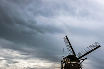 Mammatus clouds over a dutch windmill