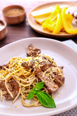 Plate with tasty pasta and mushrooms, closeup