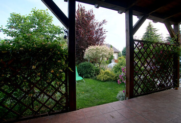 view from the terrace with pergolas on the garden
