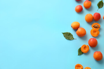 Tasty ripe apricots on color background