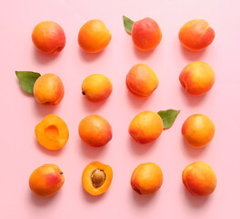 Tasty ripe apricots on color background