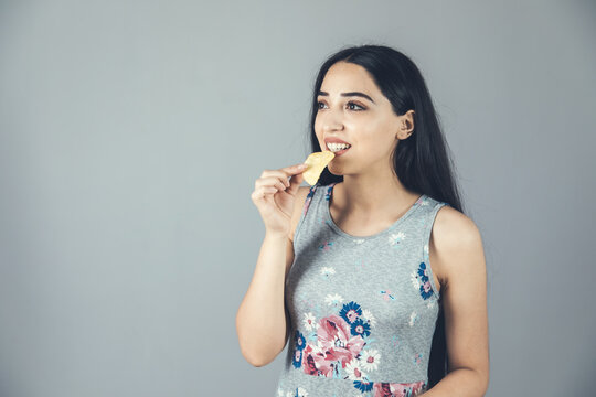 Woman Hand Holding Chips