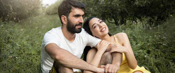 happy woman and man in the garden