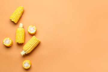 Fresh cut corn cob on color background