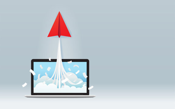 Startup business project concept with red paper plane launch from laptop screen on gray background