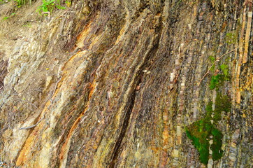 Rock layers - a colorful formations of rocks stacked over the hundreds of years. Interesting background with fascinating texture.