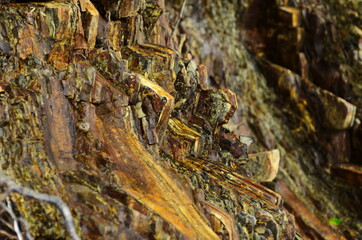 Rock layers - a colorful formations of rocks stacked over the hundreds of years. Interesting background with fascinating texture.