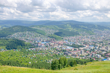 Fototapeta na wymiar Top view of the city in the mountains on Altai Gorno-Altaysk 