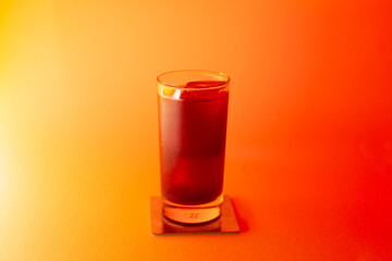 Fototapeta na wymiar Lemon tea on colour background. Beverage for summer.