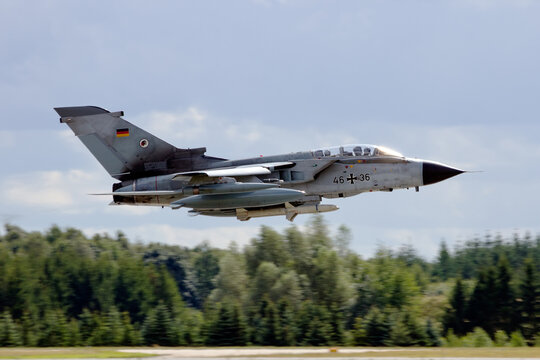 LAAGE, GERMANY &ndash; AUG 23, 2014: A German Air Force Panavia Tornado IDS from AG-51 takes off during the Laage airbase open house. AG-51 is a tactical reconnaissance wing of the German Air Force.