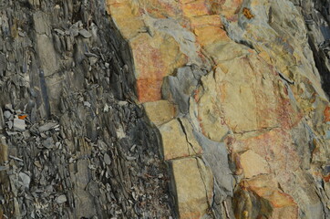 Rock layers - a colorful formations of rocks stacked over the hundreds of years. Interesting background with fascinating texture.