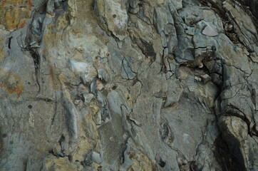 Rock layers - a colorful formations of rocks stacked over the hundreds of years. Interesting background with fascinating texture.