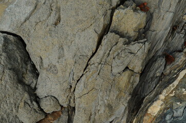 Rock layers - a colorful formations of rocks stacked over the hundreds of years. Interesting background with fascinating texture.