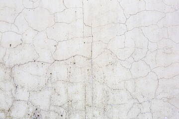 Textured surface of old stone weathered wall in the backyard