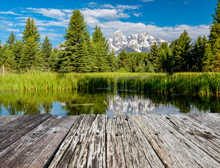Mountains in Grand Teton National Park with reflection in Snake River