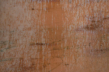 Surface of rusty metal sheet with water drops