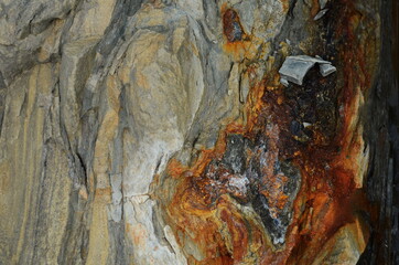 Rock layers - a colorful formations of rocks stacked over the hundreds of years. Interesting background with fascinating texture.