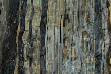 Rock layers - a colorful formations of rocks stacked over the hundreds of years. Interesting background with fascinating texture.