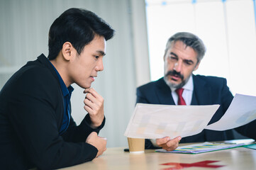 Fototapeta premium Asian men worried about presenting Senior management