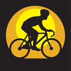 silhouette of a man cycling