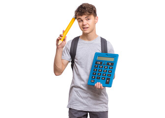 Surprised student holding big calculator and pencil. Portrait of funny thoughtful teen boy, isolated on white background. Shocked or pensive child Back to school.