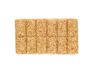 pressed sweet sesame bar on a white background. Sesame Kozinaki