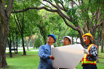 group of environment engineer visiting the area site following restore green area project