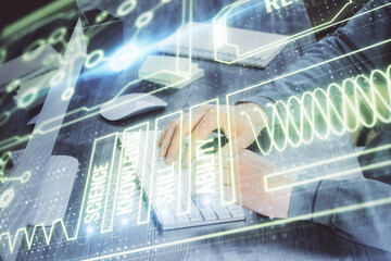 Science hologram with man working on computer on background. Concept of study. Double exposure.