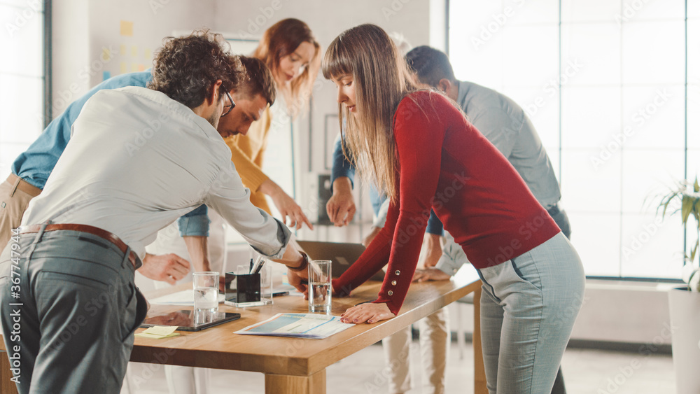 Poster startup meeting room: team of entrepreneurs standing around conference table have discussions, solve