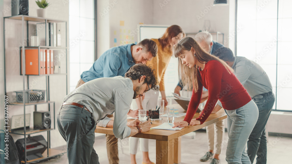 Poster startup meeting room: team of entrepreneurs gather around conference table have discussions, solve p