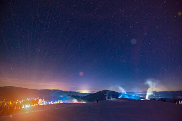 The resort ski resort illuminated at night