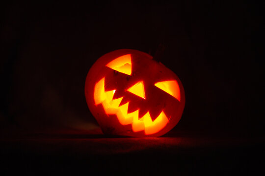 Scary halloween pumpkin for holiday on blue background