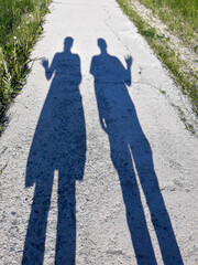 walk on the road, shadows on the ground