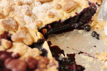 Delicious blueberry pie on the table macro